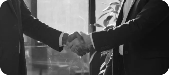 Acuerdo empresarial representado por un apretón de manos
